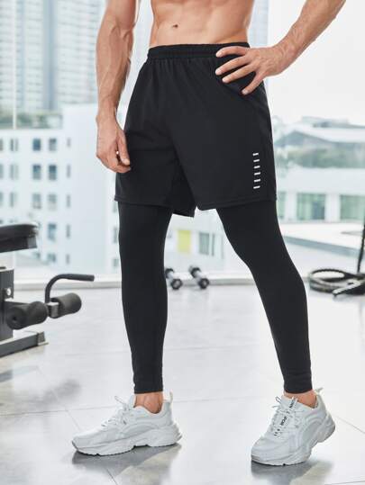 Manfinity Fitness Pantalones deportivos de estilo de novio, 2 en 1, con cinta reflectante