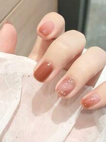 使用24入組長方形豆沙素色腮紅亮片假指甲和1入組指甲銼和1張膠帶打造迷人魅力 - 亮橙色 - 查看 1