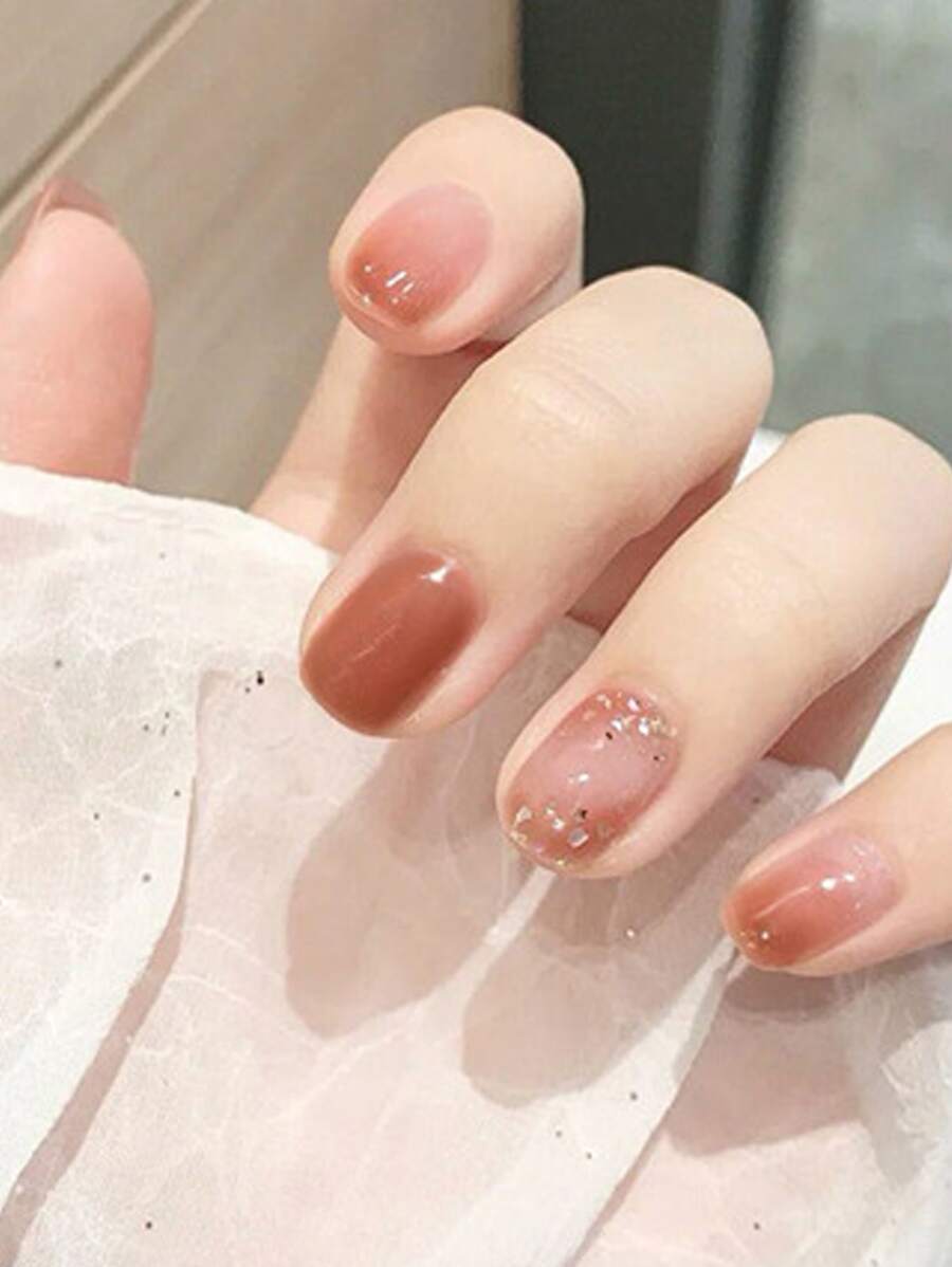 使用24入組長方形豆沙素色腮紅亮片假指甲和1入組指甲銼和1張膠帶打造迷人魅力 - 亮橙色 - 查看 1