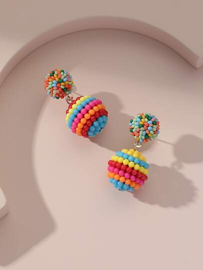 Pendientes largos redondos de color al azar