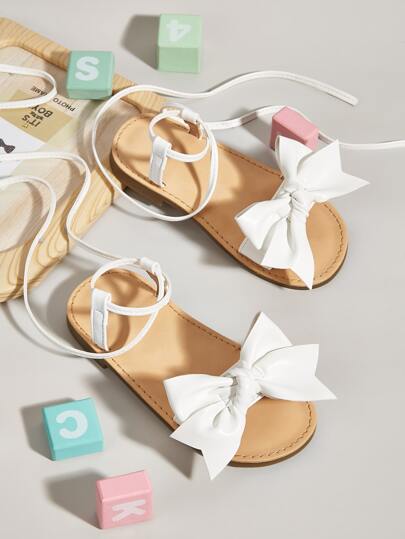 女孩蝴蝶結裝飾腿部繫帶設計綁帶涼鞋