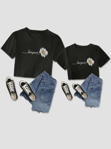 SHEIN Sparklyn Tween Girl 1pc Fashionable Casual Short Top, Daisy & Letter Print, Round Neckline - Black - View 3