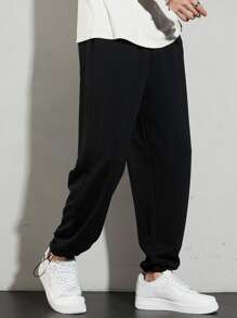 Manfinity Homme Quần thể thao Nam Dây kéo Túi màu trơn - màu đen - Xem 1