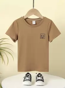 SHEIN 1 pieza Top de manga corta cómodo y transpirable con estampado de cara sonriente para niño joven, adecuado para primavera y otoño, ocasiones informales, versátil para fiestas, uso diario, escuela, viajes, y reuniones