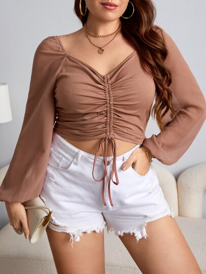Top corto con cordón delantero de manga farol