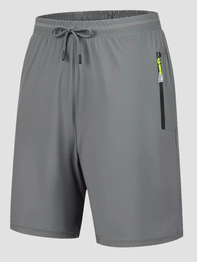 男士腰部抽繩拉鏈細節運動短褲