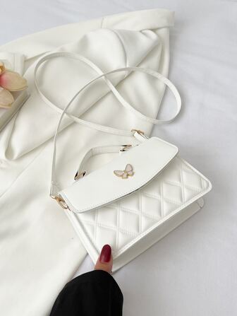 幾何格紋衍縫蝴蝶裝飾翻蓋方包