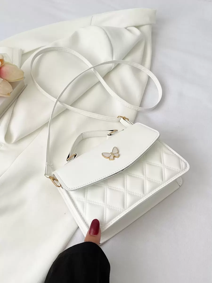 幾何格紋衍縫蝴蝶裝飾翻蓋方包