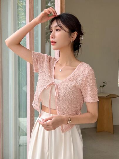 DAZY ソリッド ノットフロント キャミトップなし トップスの画像