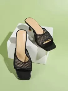 Sandalias minimalistas con tacón de aguja de malla, mulas de color sólido ahuecadas de moda negras