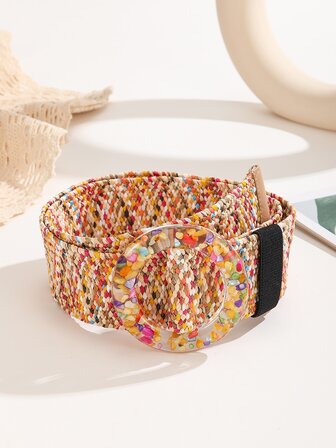 Cinturón trenzado con hebilla redonda