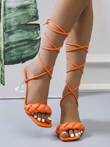 Sandalias con diseño trenzado de pierna con cordón con diseño transparente tacón pirámide