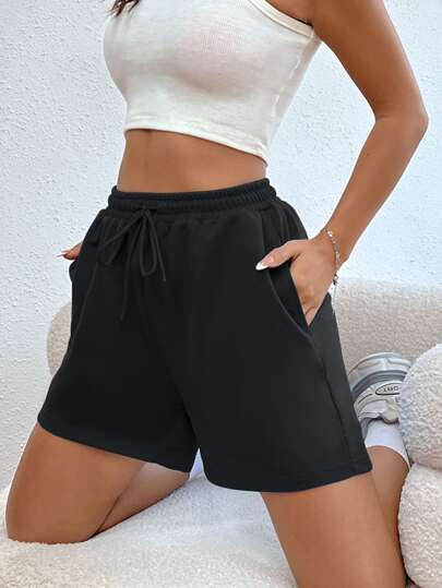 SHEIN MOOSTA Drawstring Waist Slant Pocket Shorts