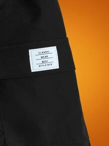 SHEIN Tween Boy Letter Patched Detail Flap Pocket Shorts