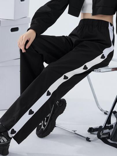 Pantalon de jogging pour femmes avec imprimé cœur et coutures latérales contrastées, vêtements de rentrée scolaire pour l'automne