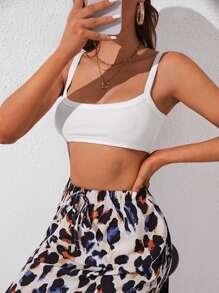 SHEIN Essnce Top de tirantes corto unicolor tejido de canalé