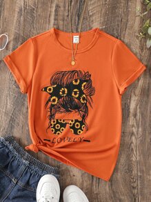 SHEIN Camiseta de cuello redondo linda y cómoda simple de estilo urbano para niña preadolescente con estampado de cara de dibujos animados - Naranja - Ver 1