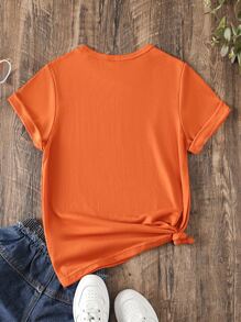 SHEIN Camiseta de cuello redondo linda y cómoda simple de estilo urbano para niña preadolescente con estampado de cara de dibujos animados - Naranja - Ver 2