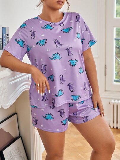 Ensemble de pyjama avec imprimé de patte et de dinosaure