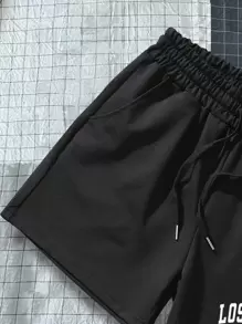 Manfinity Sporsity Heren Letter Grafisch Trekkoord Taille Shorts Zweet Los Angeles Workout Papa en ik