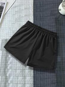 Manfinity Sporsity Heren Letter Grafisch Trekkoord Taille Shorts Zweet Los Angeles Workout Papa en ik