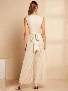 SHEIN Belle Mono elegante de pierna ancha con lazo en la espalda y unicolor, para invitado de boda