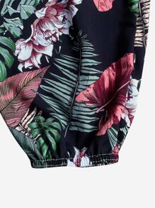 SHEIN Holidaya Wygodne i eleganckie spodnie damskie z dużym nadrukiem kwiatowym