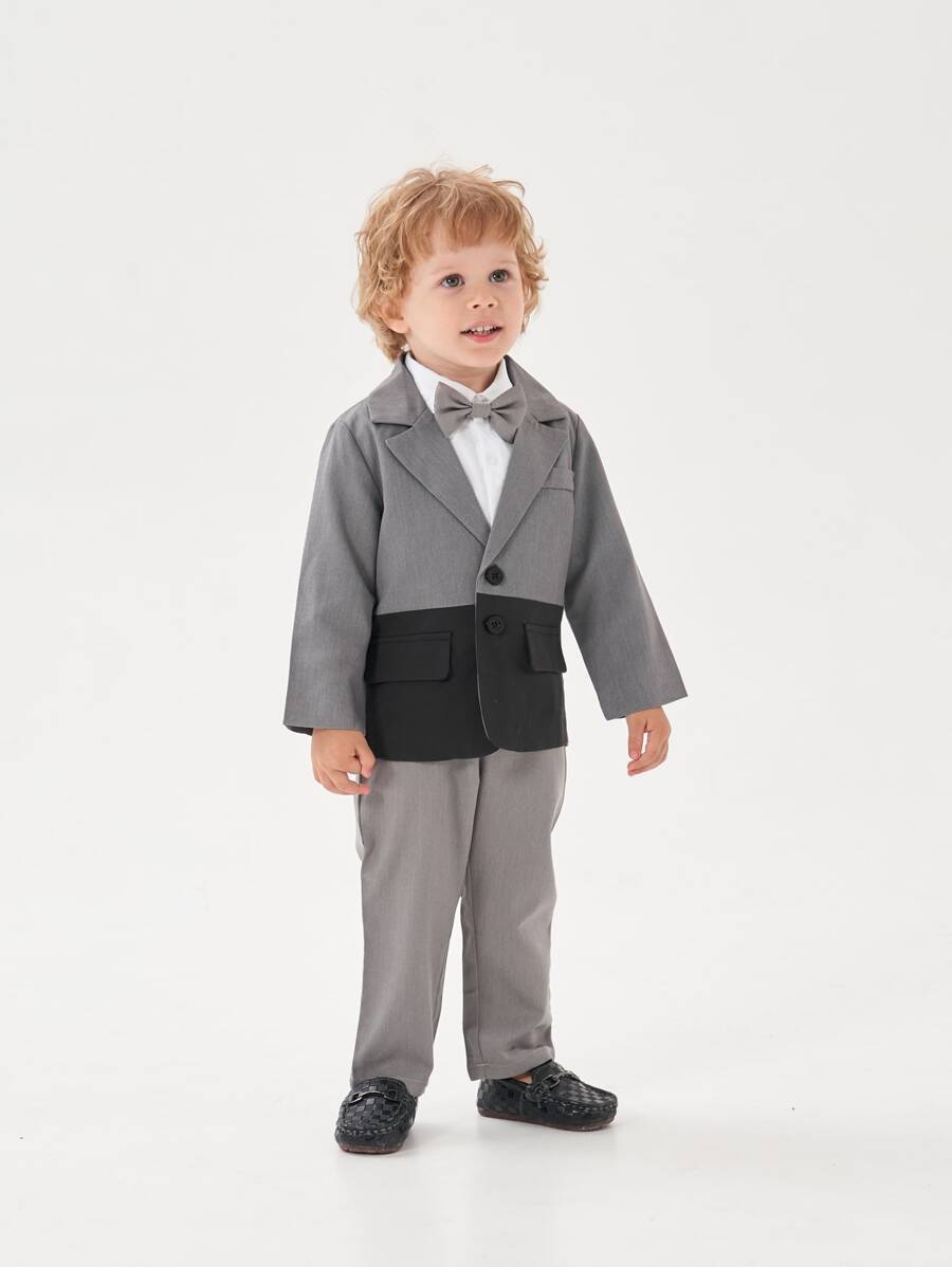 小男童西裝領西裝外套和前蝴蝶結襯衫和褲子