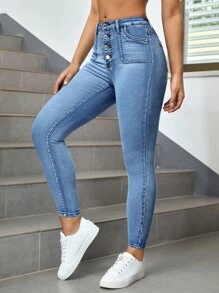 SHEIN Essnce Jeans ajustados con botón