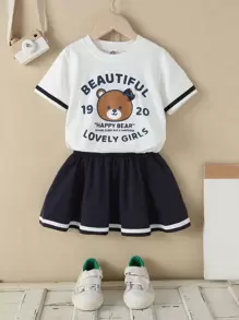 Souflis Souflis Camiseta Y Falda De Dibujo Animado Y Gráfico De Letras Para Niñas Jóvenes - Azul y blanco - Ver 1