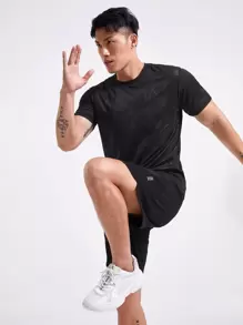 Manfinity Sport Corelite Camiseta deportiva con estampado geométrico para hombre, parte superior de conjunto combinado para entrenamiento de hombre, conjunto combinado para hombre - Negro - Ver 1