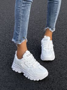 秋冬新款圆头系带拼接纯色时尚厚底都市户外运动鞋女款，女式运动鞋