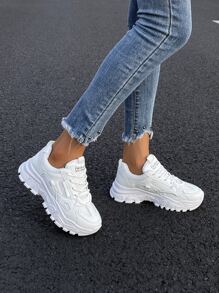 秋冬新款圆头系带拼接纯色时尚厚底都市户外运动鞋女款，女式运动鞋