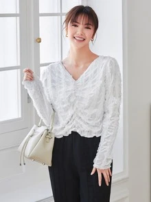 Blus polos lengan mengembang dengan detail rumbai di bagian bawah. - Putih - View 1