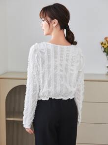 Blus polos lengan mengembang dengan detail rumbai di bagian bawah. - Putih - View 2