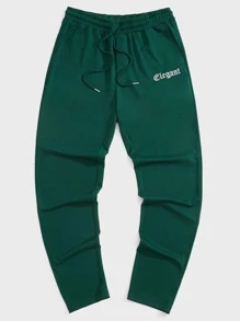 Manfinity RebelGame Quần thể thao Nam Dây kéo Túi Lá thư - Màu xanh lá cây đậm - Xem 1