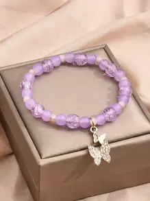 Bracelet perlé à strass à breloque papillon