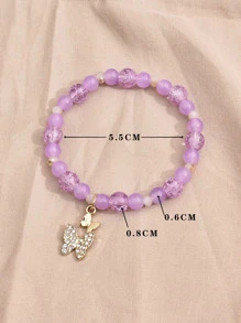 Bracelet perlé à strass à breloque papillon