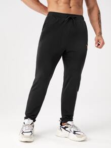 Fitness Quần thể thao nam có dây rút, in chữ phản quang, kiểu quần nỉ. - màu đen - Xem 4