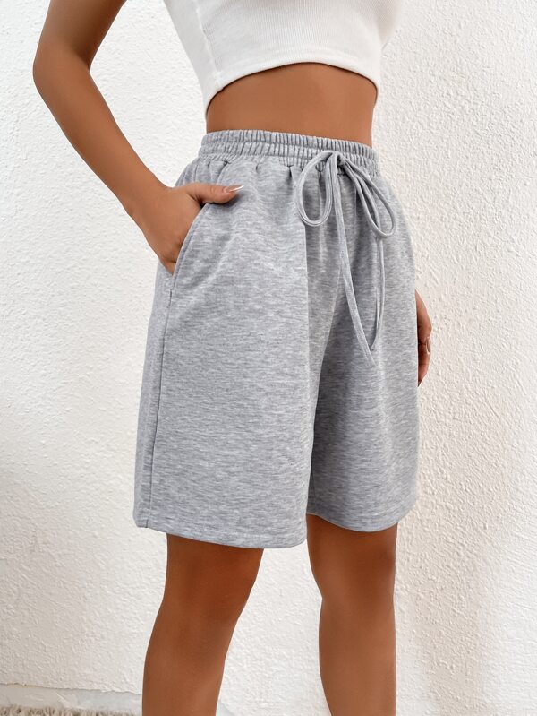 SHEIN EZwear Solid Knot Waist Slant Pocket Shorts