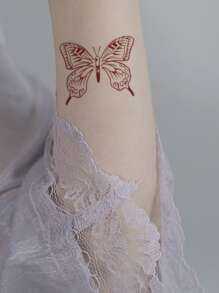 ملصق وشم فراشة و بطباعة قلب 4 أوراق