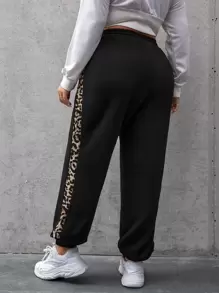 SHEIN Essnce Plus Size Quần thể thao Dây kéo In hoa Báo - màu đen - Xem 2