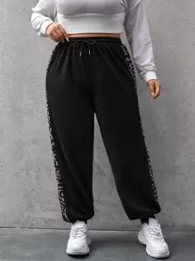 SHEIN Essnce Plus Size Quần thể thao Dây kéo In hoa Báo - màu đen - Xem 5