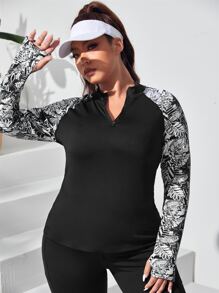 Camiseta deportiva en contraste hoja de manga raglán agujeros para pulgares - Negro - Ver 1