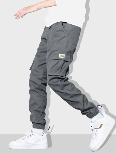 Manfinity Homme Pantaloni cargo cu buzunare cu clapă și petice pentru bărbați, pantaloni cargo gri pentru bărbați, pantaloni streetwear pentru bărbați, pantaloni cargo joggers pentru bărbați, pantaloni sport, pantaloni cargo pentru bărbați, toamnă