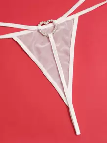 Lencería tanga con malla enlazada y anillo con corazón de strass