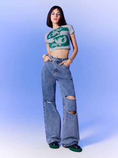 بنطلون جينز بساق واسع ممزق وبسستة