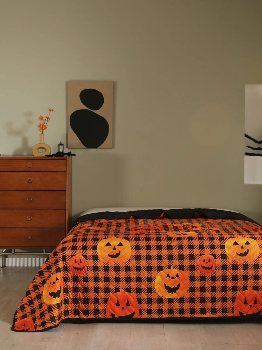 Colcha Halloween con patrón de calabaza