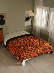 Colcha Halloween con patrón de calabaza