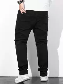 Manfinity Homme Jeans rectos de pierna estrecha con rotos y algodón plus para hombres, ajuste slim, jean largo con flecos, liso negro, para trabajo casual, salir, pasear, ir al trabajo, vacaciones, calle, estilo grunge - Negro - Ver 2